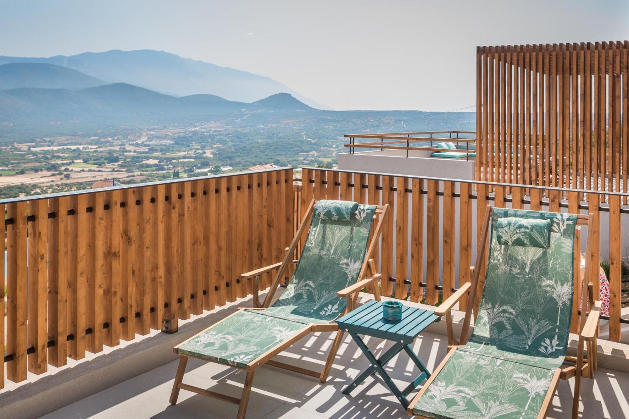 Harmony Suites Χελμάτα Δωμάτιο φωτογραφία
